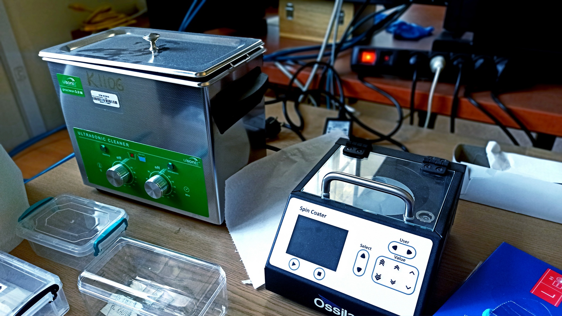 Spin coater and ultrasonic cleaner